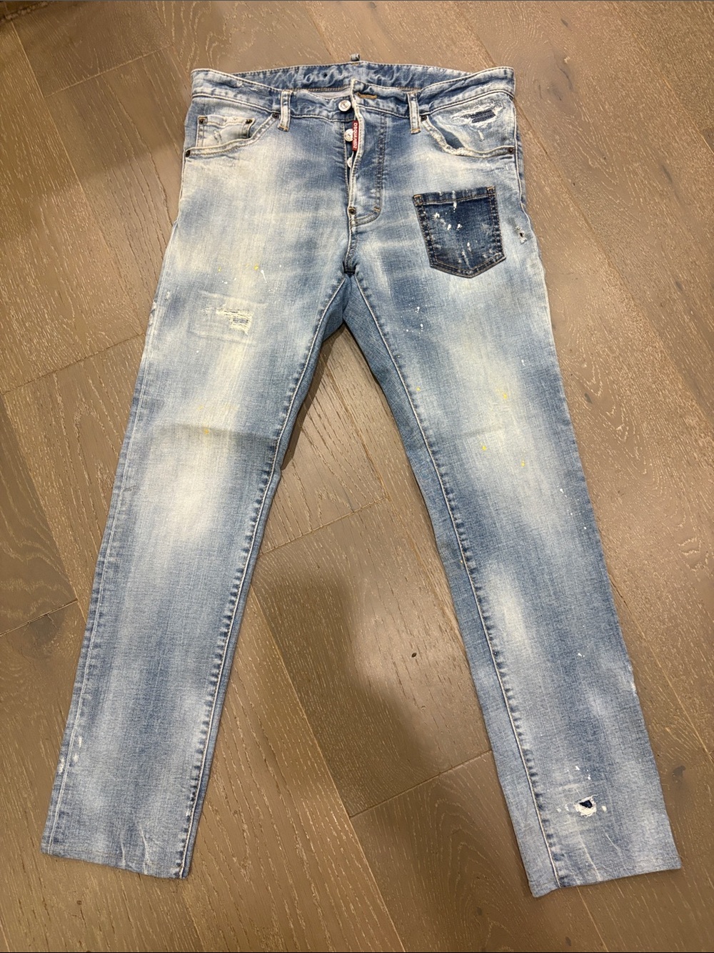 DSQUARED2 Light BlueMen’s Jeans with Distressed & Paint-Splatter